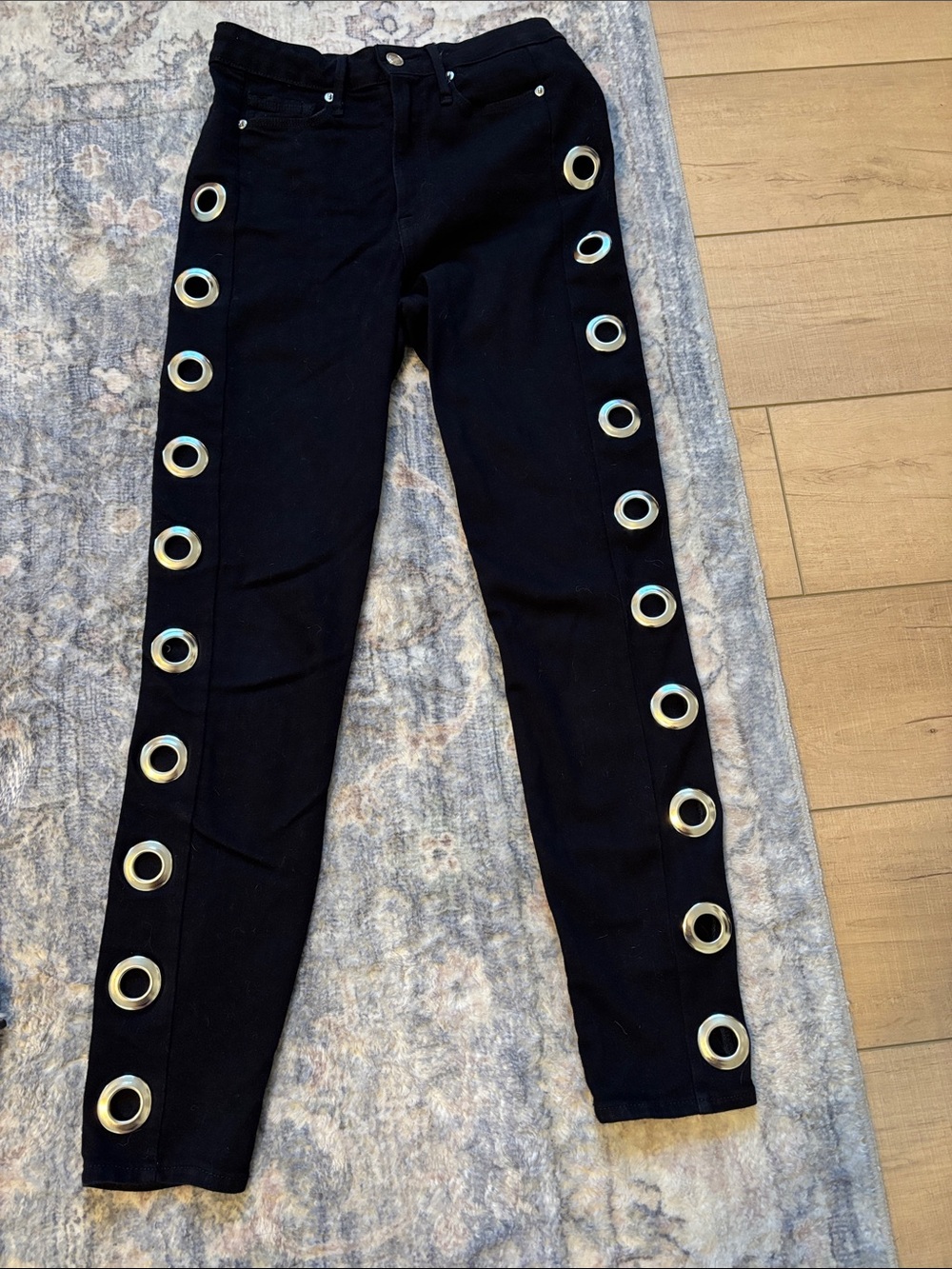 Good American Black Skinny Pants with Gold Grommets